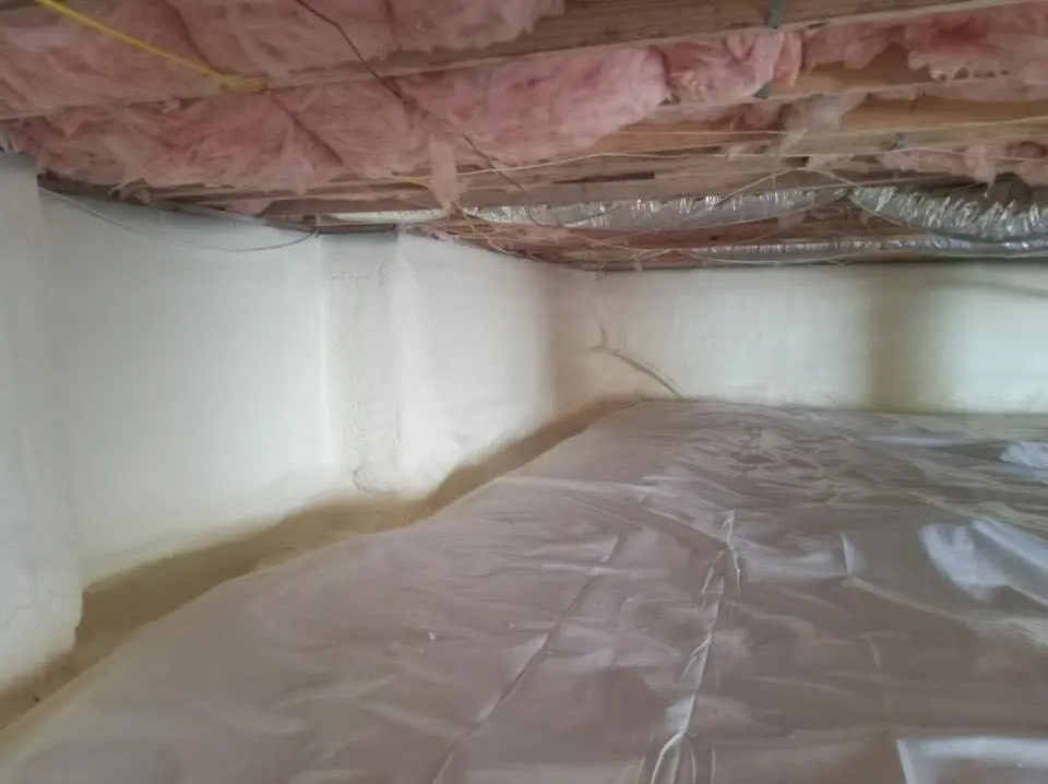 Crawl space encapsulation with closed-cell spray foam for Storm Damage Roof Repair in South Beloit